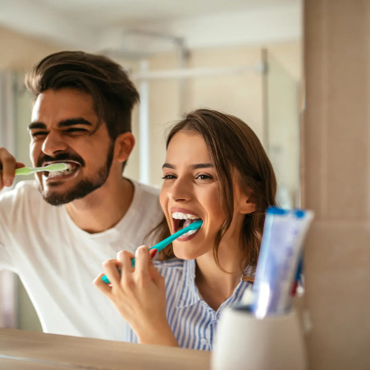 People brushing their teeth